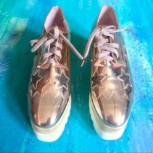 Via Pinky Metallic Rose Gold Lace Up Platforms
